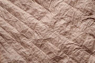 Crumpled kraft paper. Texture crumpled recycled old paper.
