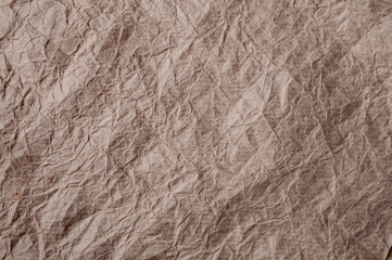 Crumpled kraft paper. Texture crumpled recycled old brown paper.