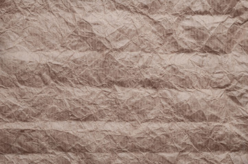 Crumpled kraft paper. Texture crumpled recycled old brown paper.
