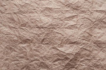 Crumpled kraft paper. Texture crumpled recycled brown paper.