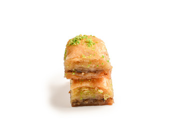 Pistachio baklava on a white background. Dessert.