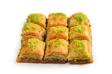 Pistachio baklava on a white background. Dessert.