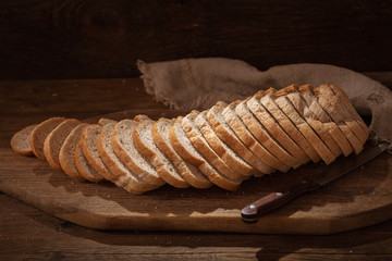 sliced bread on wooden board