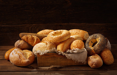 Fresh bread on wooden table