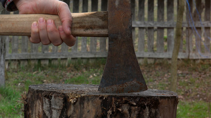 Sledgehammer over the wood block 