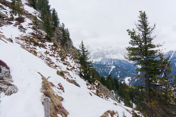 Hiking paths covered with snow in april in val gardena, dolomites, italy