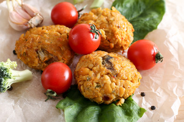 Chickpea cutlet and pasta on a white plate