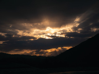 sunset in the mountains by the river Ukraine