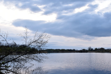 The sky at sunset and the quiet river Mukhavets