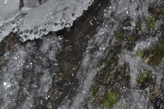 water flowing over rocks © Sergiy
