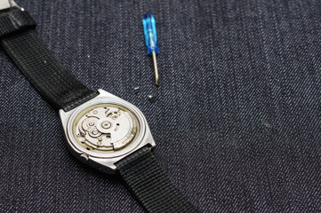 Closeup machine watch using as a background or wallpaper