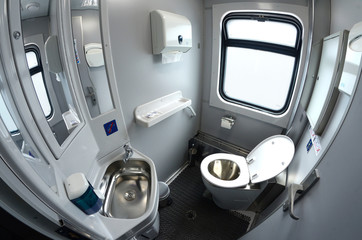 Toilet in Ukrainian Railways First Class sleeping carriage of a passenger train – toilet-bowl,...