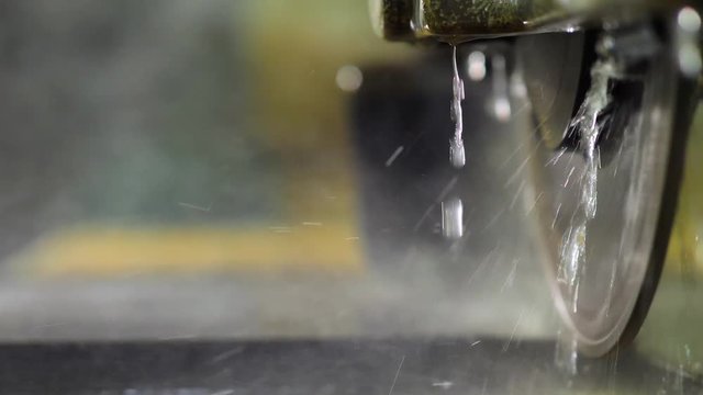 The industrial cutting factory marble cooled with water while being cutting