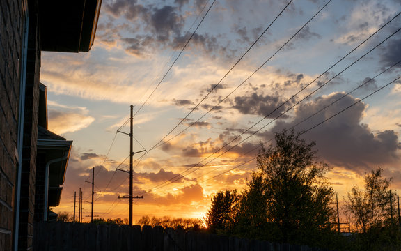 Power Lines Sunset Residential Area In The City