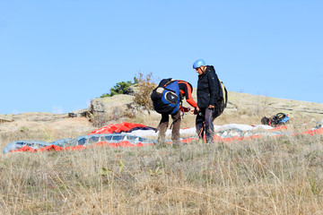 Paraglider tandem preparation for taking off