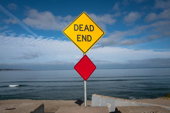 A dead end sign on the California coastline