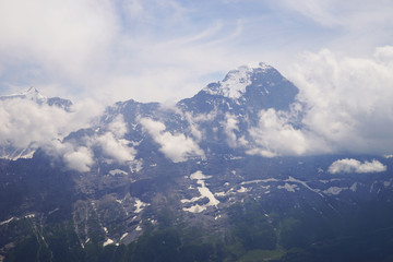 Alpine peaks of Grindelwald and Jungfrau. Landskape background of Bernese highland. Alps, tourism, journey, hiking concept.
