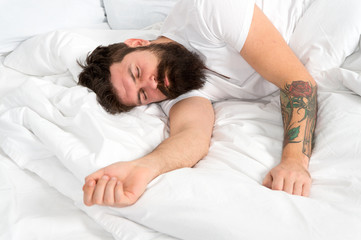 Impossible to wake up. brutal sleepy man in bedroom. asleep and awake. mature male with beard in pajama on bed. energy and tiredness. bearded man hipster sleep in morning. Too lazy to wake up