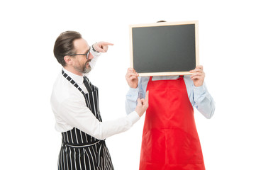 Workers wanted. Hipster bartender show blackboard copy space. Men bearded hipster informing you. Opening soon. Men bearded bartender or cook in apron hold blank chalkboard. Bartender with blackboard