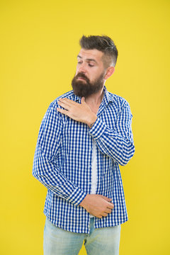 Shake It Off. Summer Hipster. Brutal Bearded Hipster In Checkered Shirt Brush Dust Off Shoulder. Male Fashion. Pedantic Man With Beard On Yellow Backdrop. Mature Man. Everything Must Be Perfect