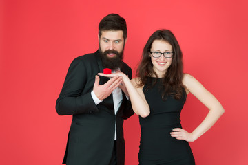 happy valentines day. sexy couple in love. love date and romance. proposal ring. formal couple. ring in box. tuxedo man and elegant lady at engagement party. woman make bearded man marriage proposal