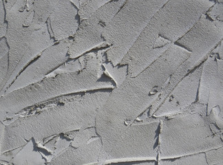 Rough gray cement plaster smears background
