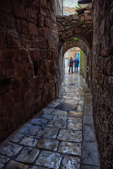 Dark and Narrow streets in the Old City of Akko. Taken in Acre, North District, Israel.