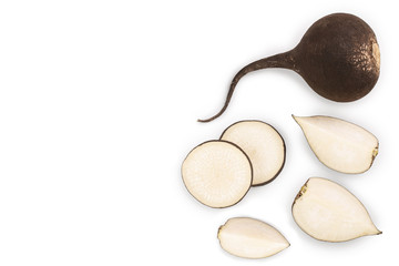 Black radish with slices isolated on white background with copy space for your text. Top view. Flat lay