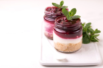 Cherry bisquit dessert with ricotta, mint. Yogurt cheesecake breakfast