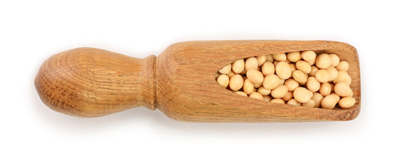 soybeans in wooden scoop isolated on white background top view