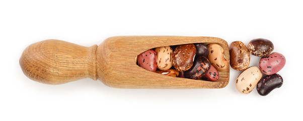 variegated kidney bean in wooden spoon isolated on white background. Top view. Flat lay