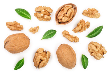 Walnuts with leaf isolated on white background. Top view. Flat lay