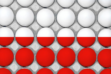 Chicken eggs painted in the style of the Poland flag. Chicken eggs in carton box. Top view eggs background.