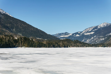 Fototapeta na wymiar early spring landscape of frozen Three Valley Lake Regional District of Columbia-Shuswap Canada.