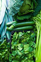 Detox diet concept: green vegetables on rustic table