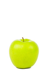 Green apple on white background. Isolated apple. Green fruit. Blank for designer. Vegetarian food