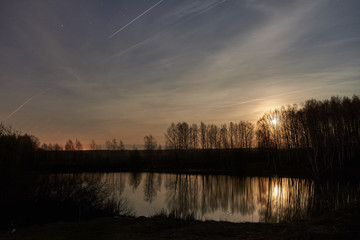 Obraz premium The sky with star at the lake in the twilight after sunset.