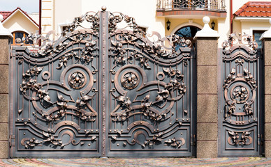 Forged iron gates. View of wonderful forged gates in full size
