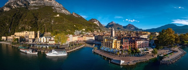 Riva del Garda,Lago di Garda ,Italy - 24 October 2018: Arial Panorama of the gorgeous Garda lake surrounded by mountains in the in the autumn,View of the beautiful Riva del Garda town and Garda lake