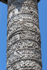 Architectural detail from of ancient Marcus Aurelius Column in front of Palazzo Chigi in city of Rome, Italy