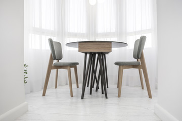 Fototapeta premium dinner tea table with chairs on the balcony