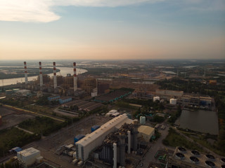 Obraz premium Aerial view Power plants, petrochemical plants At sunset.