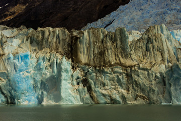 Huge wall of glacial ice in Patagonia from the Andes mountain range.