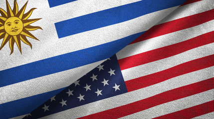Uruguay and United States two flags textile cloth, fabric texture