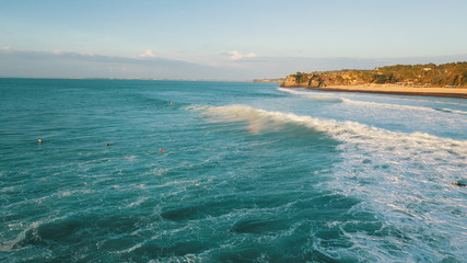 Waves, sunset and the beach