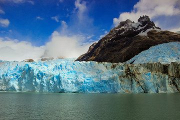 Huge wall of glacial ice in Patagonia from the Andes mountain range.
