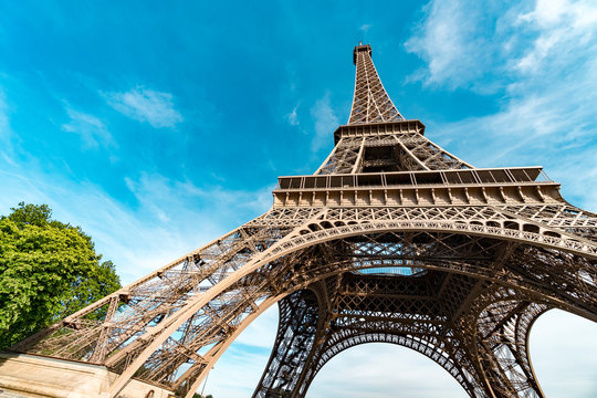 The majestic Eiffel tower construction details against morning blue sky