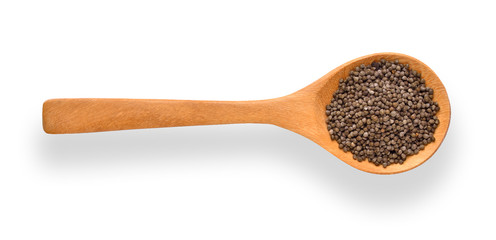 Perilla herb seed in wood spoon isolated on white background. top view