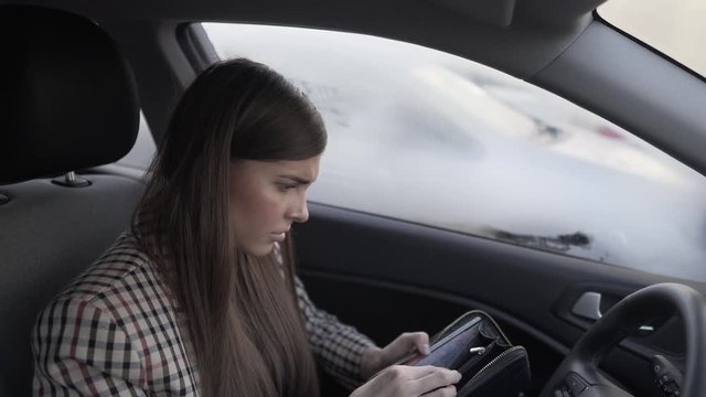 Woman Frustrated In Car When She Realises She Doesnt Have Any Money