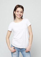 Portrait of young positive female with cheerful expression